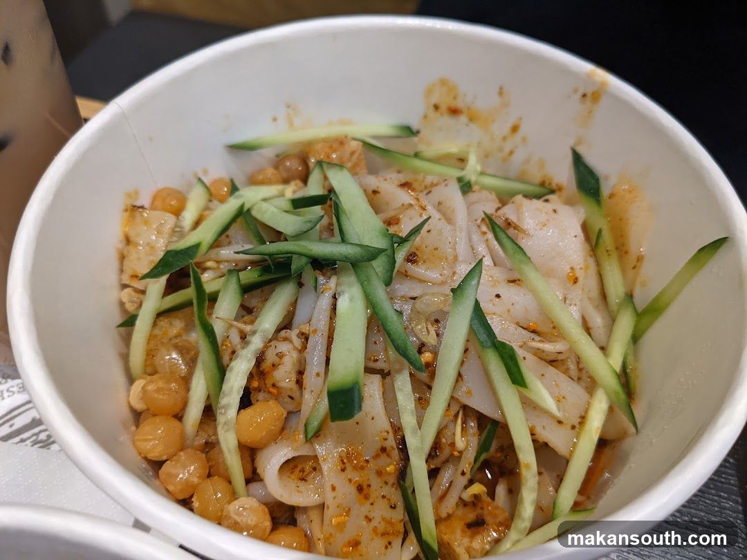 Bowl of Noodles with Cucumber and Peanuts