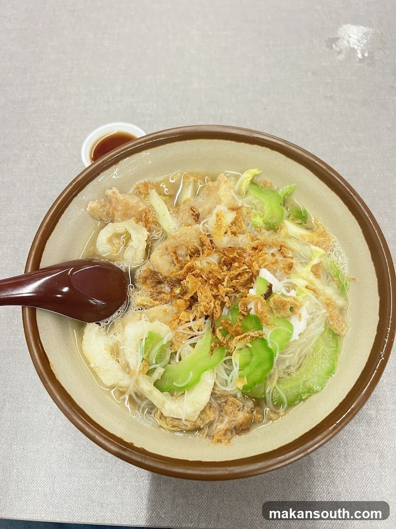 Bowl of Noodle Soup with Toppings