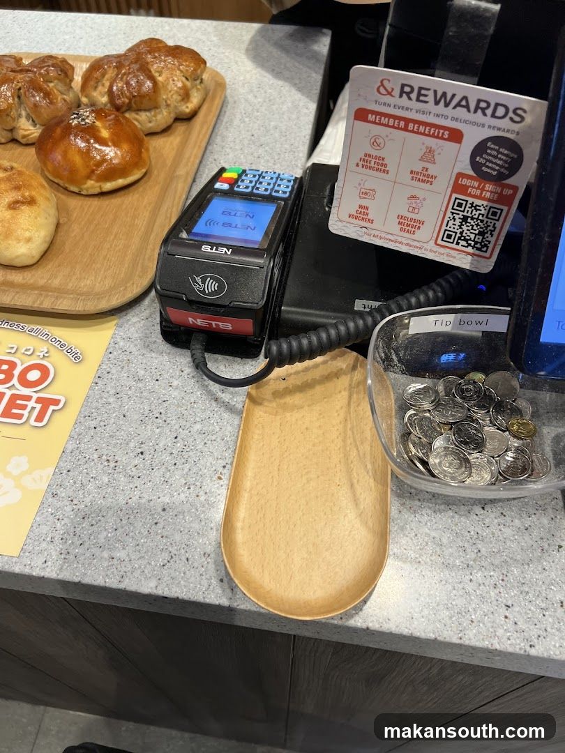 Counter with baked goods and payment terminal