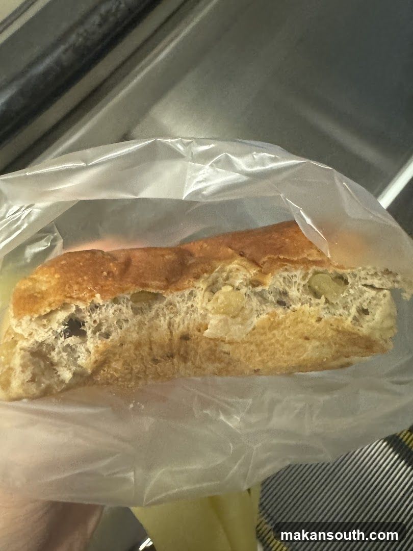 Baguette in plastic bag