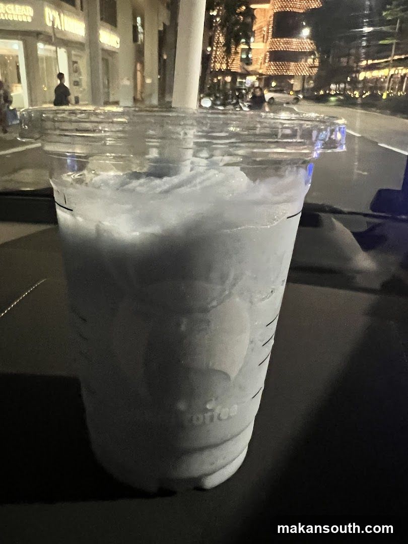 Iced Coffee in Car at Night