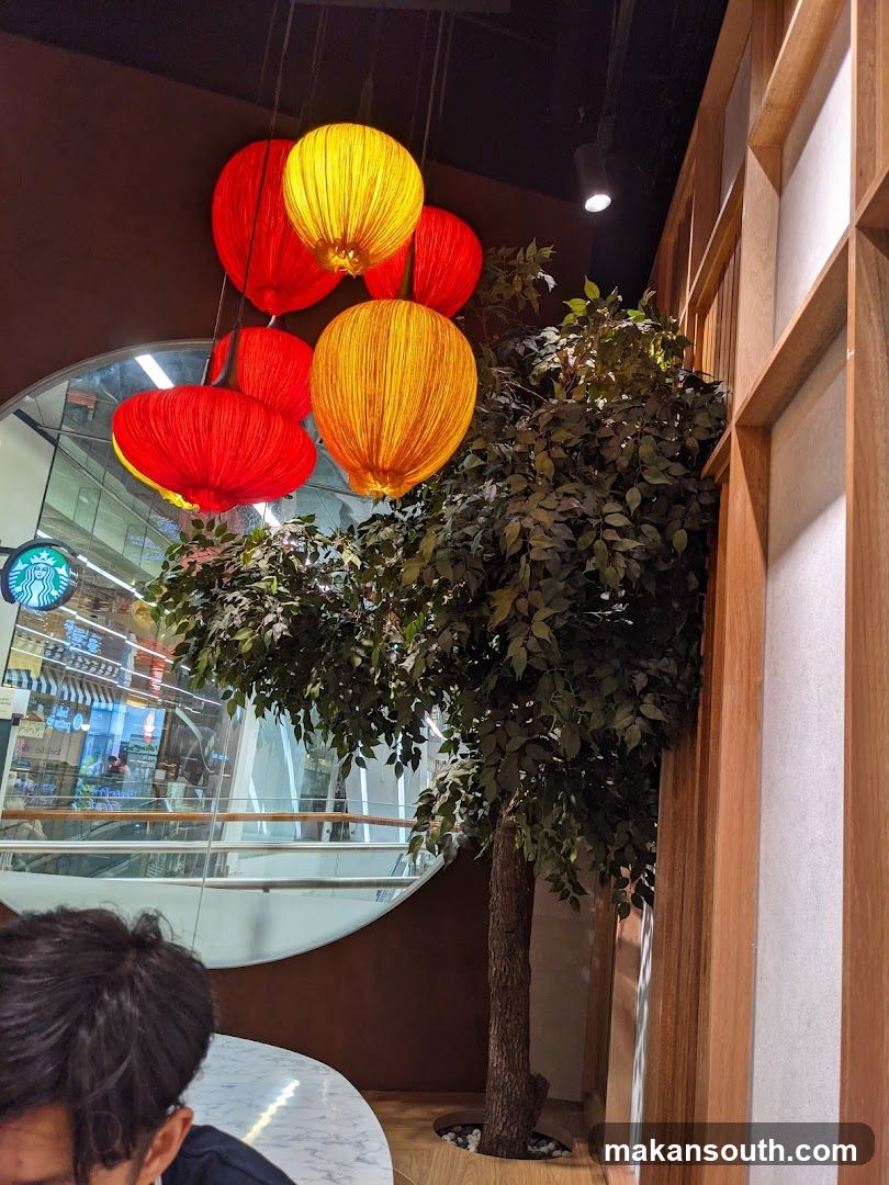 Interior with Lanterns and Plant