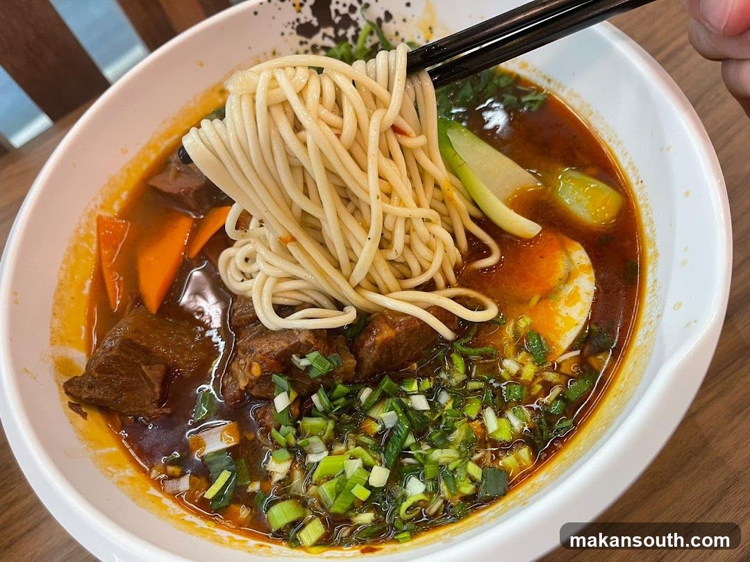 Bowl of Noodle Soup with Meat and Vegetables