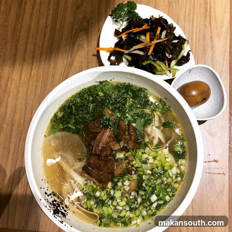 Bowl of Soup with Side Dishes