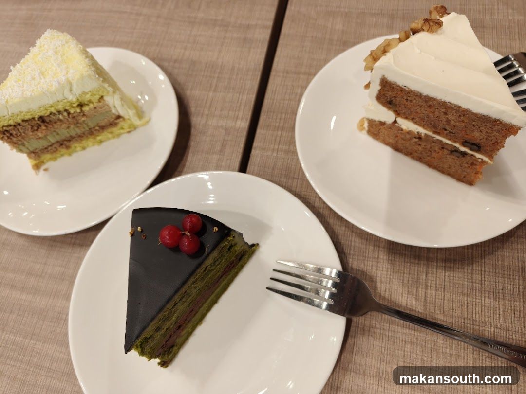 Three Slices of Cake on White Plates
