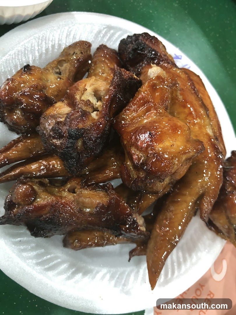 Roasted Chicken Wings on Foil Plate