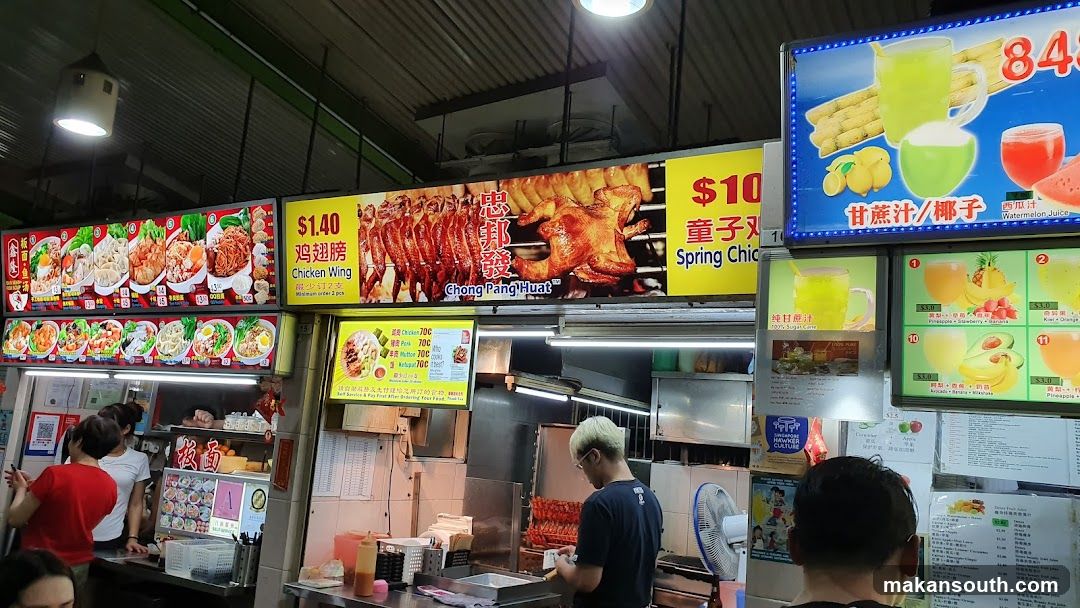 Food Stall Interior with Signage and Staff