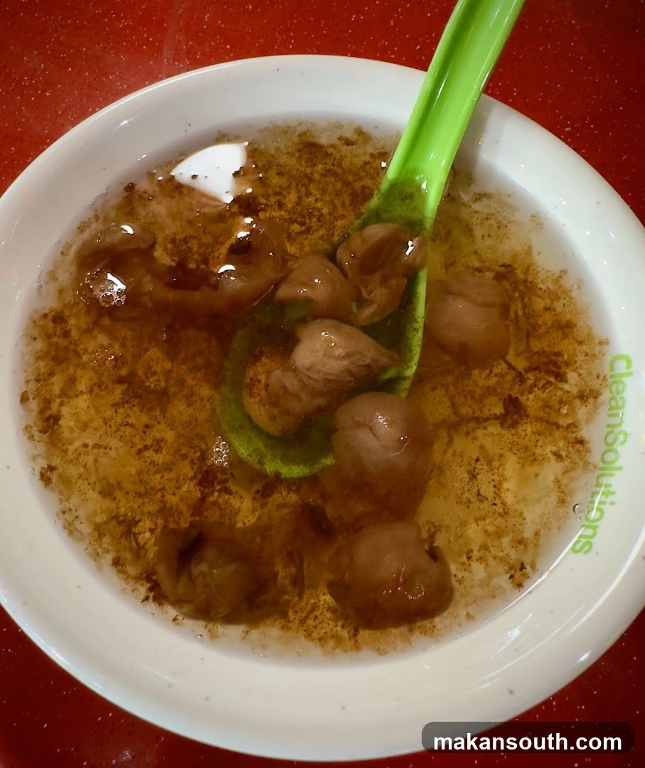 Bowl of Soup with Meatballs