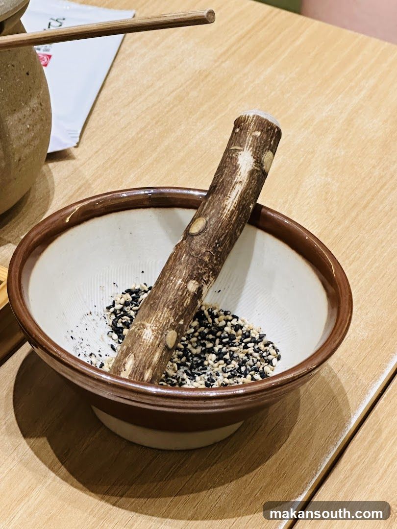 Sesame Seeds in Bowl with Mortar and Pestle