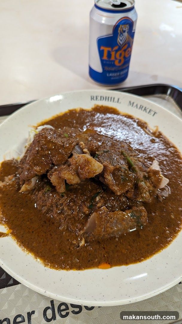 Curry Dish with Tiger Beer