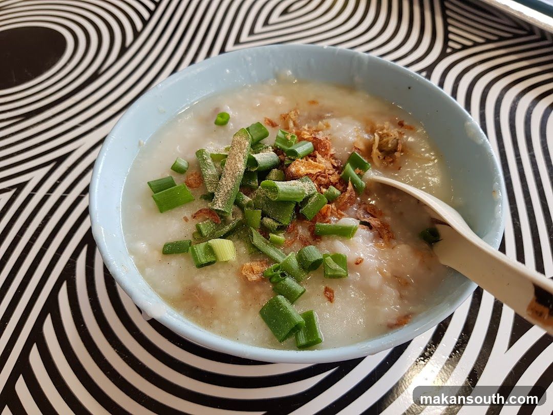 Bowl of congee with toppings