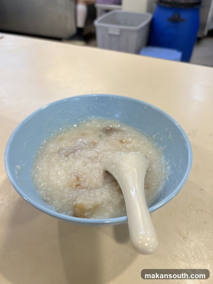 Bowl of congee with spoon