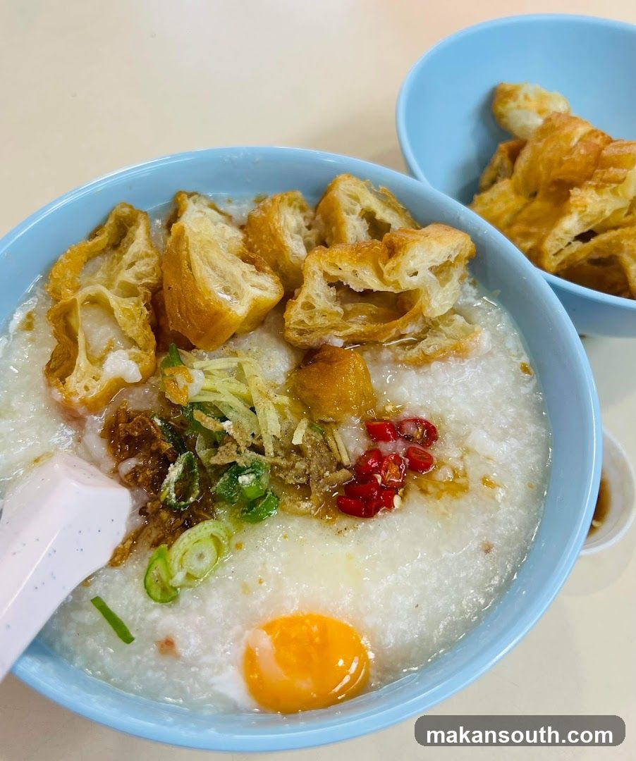 Rice Porridge Bowl with Egg and Fried Dough