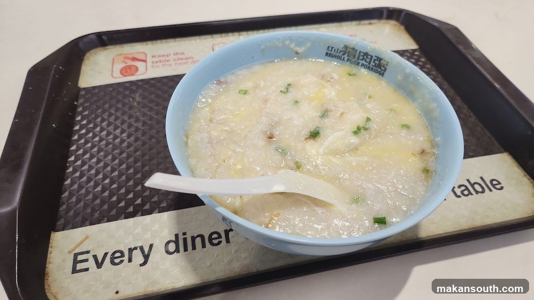 Congee in a bowl on a tray