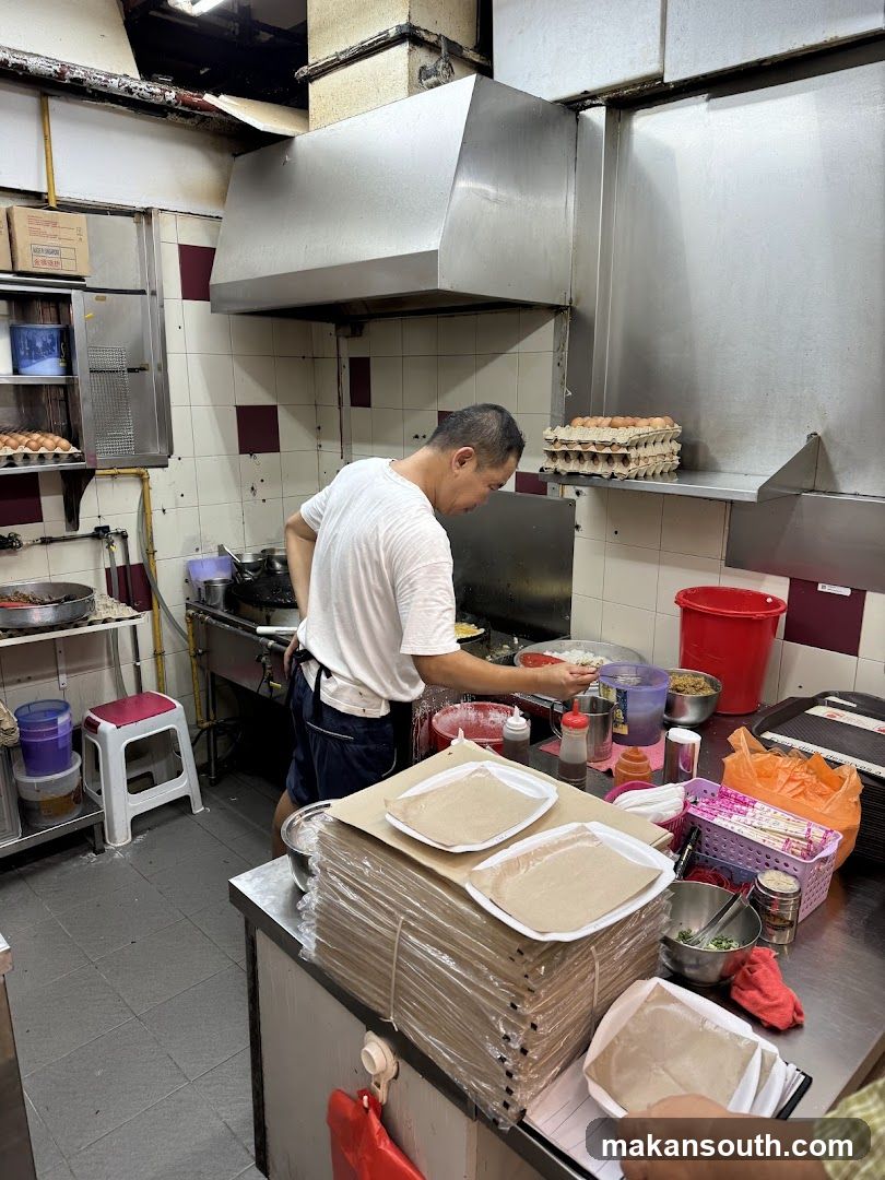 Kitchen Interior with Staff Cooking