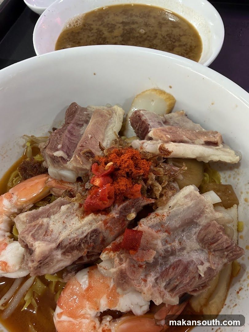Spicy Noodle Dish with Meat and Shrimp