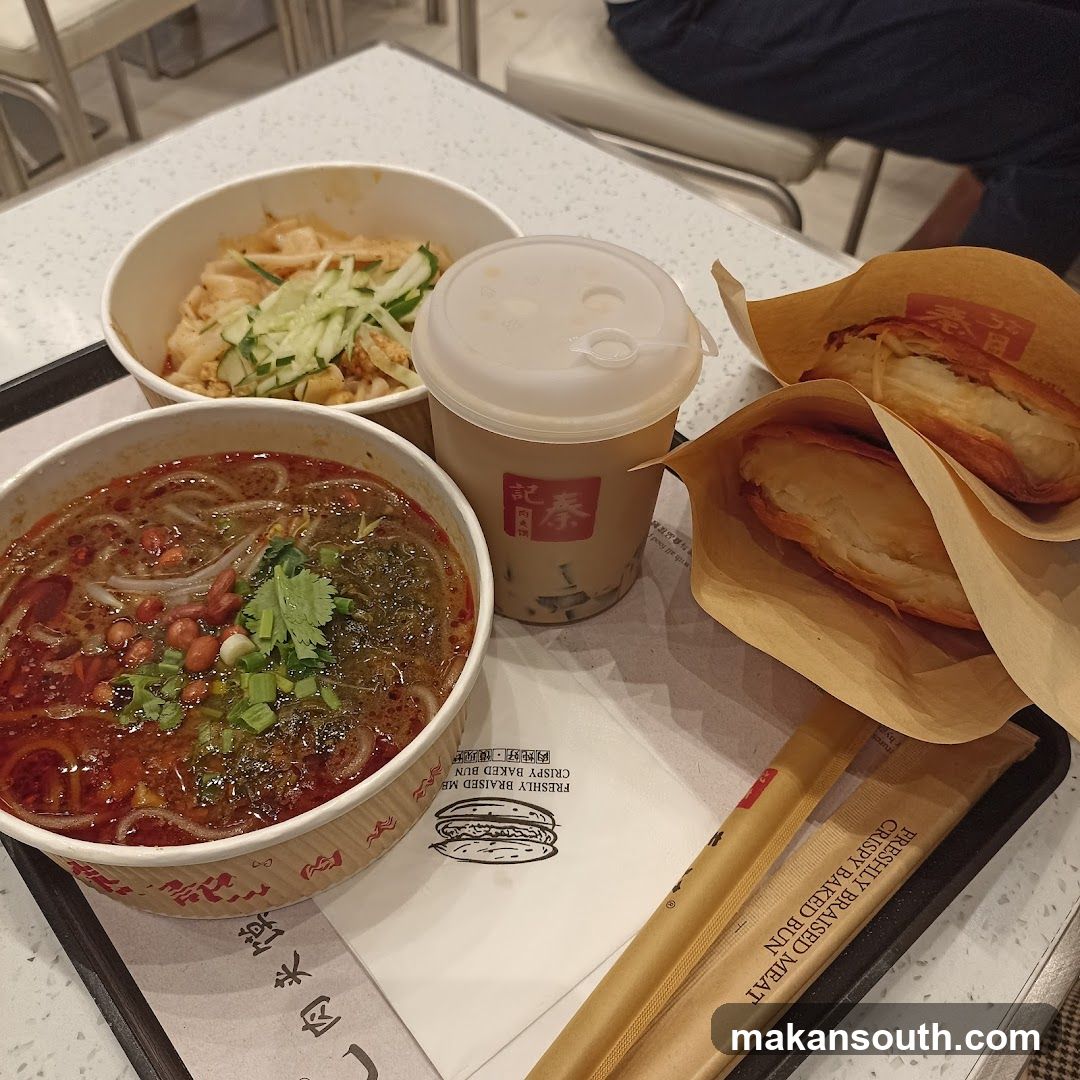 Food Tray with Noodles and Pastries