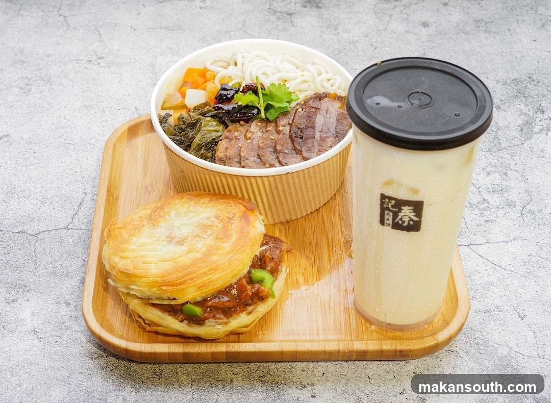 Food Tray with Noodles, Sandwich and Drink