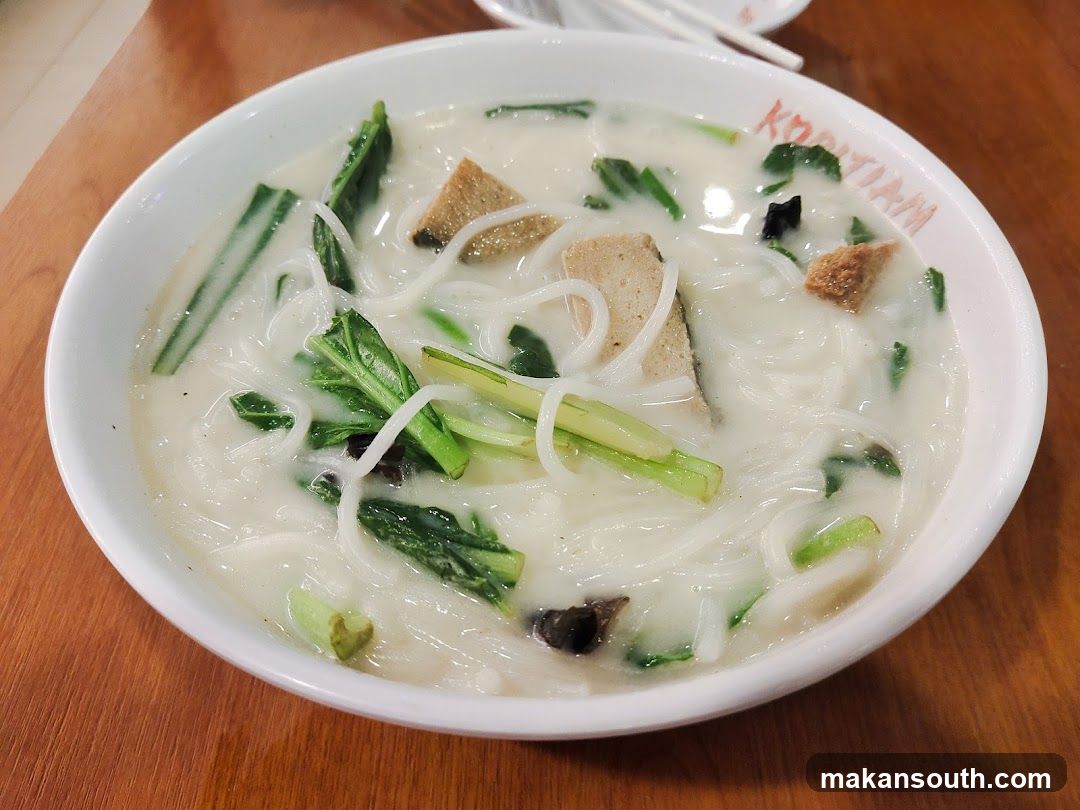 Bowl of Noodle Soup with Vegetables and Tofu