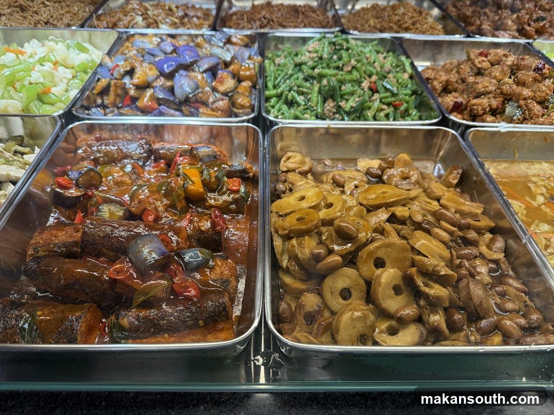 Assorted Chinese Dishes in Metal Trays