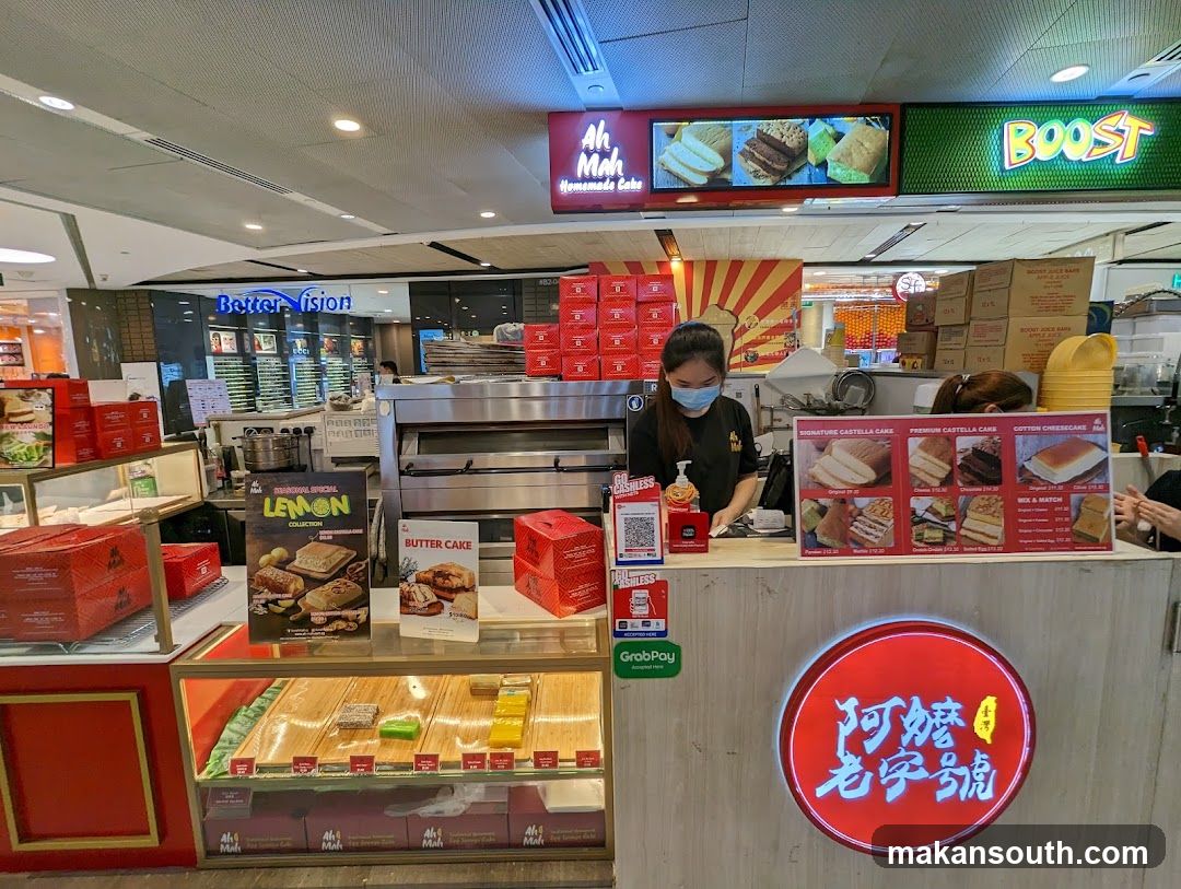 Food Stall Interior with Staff and Products