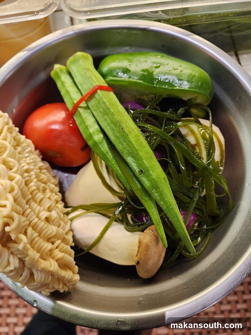 Bowl of Fresh Vegetables and Ramen Noodles