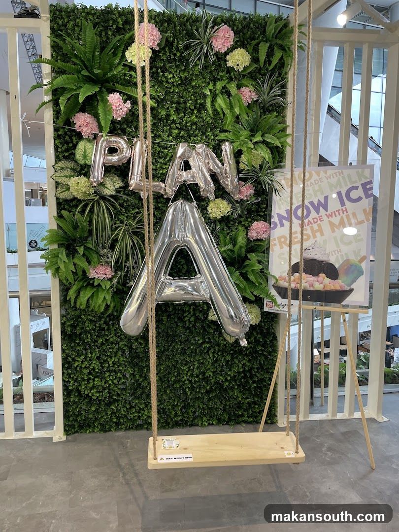 Indoor Decorative Display with Swing and Greenery Wall