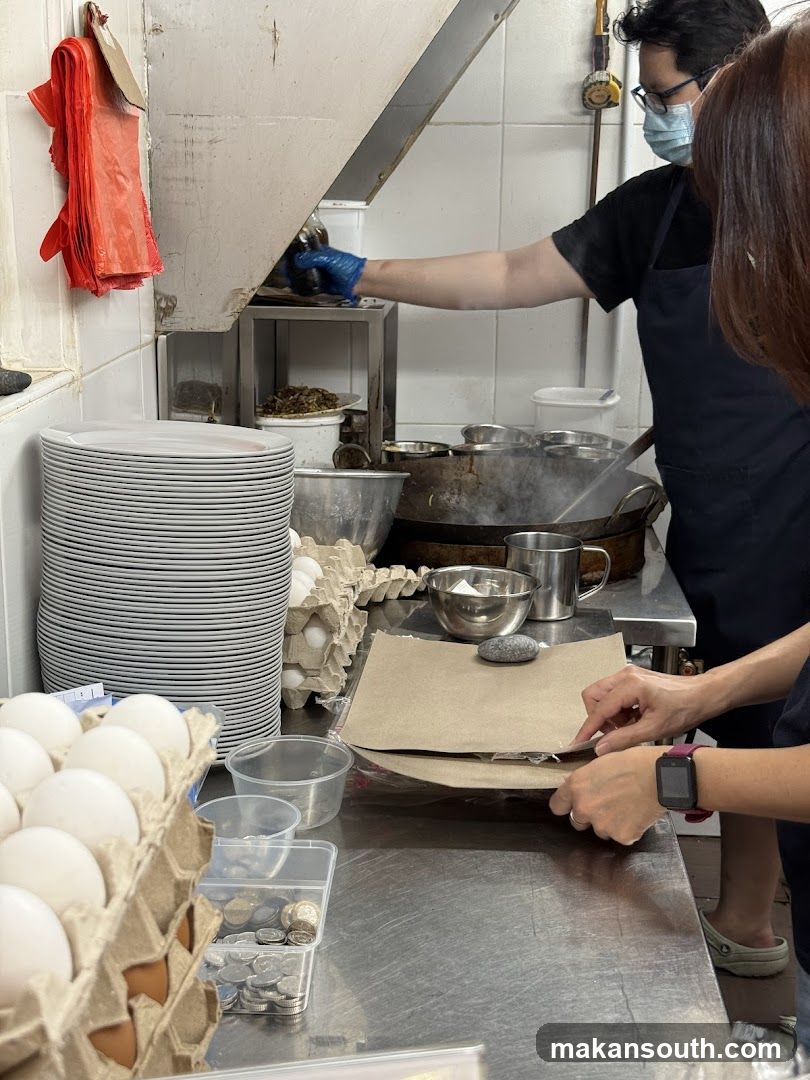 Kitchen Interior with Staff Preparing Food
