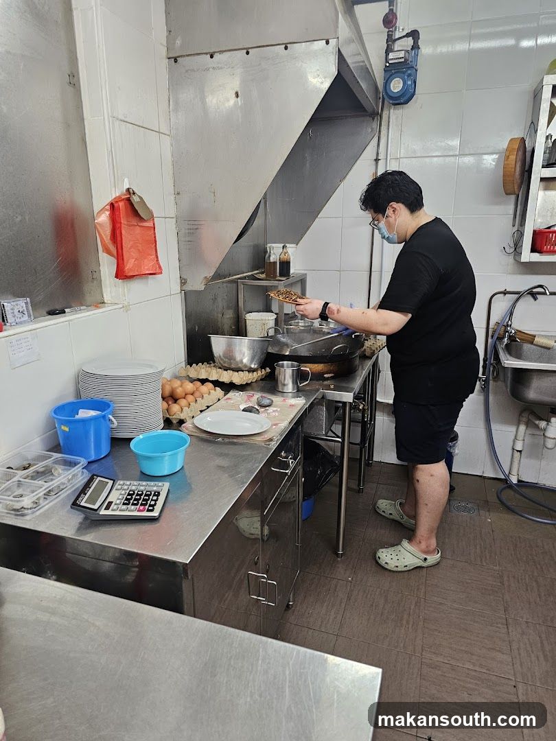 Kitchen Interior with Staff Cooking