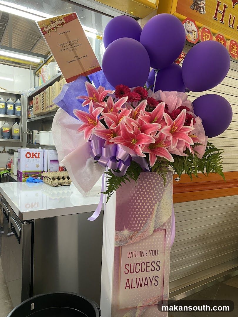 Flower and Balloon Display at Store Entrance