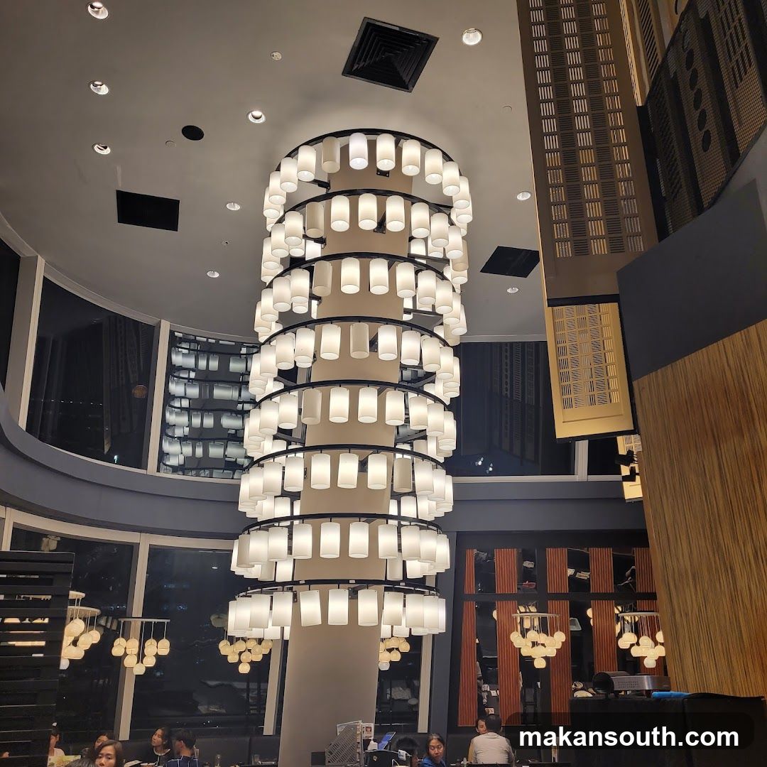 Interior of a modern restaurant or lounge with large chandelier