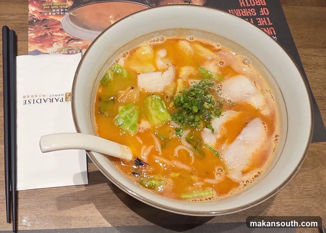 Bowl of Fish Soup with Noodles