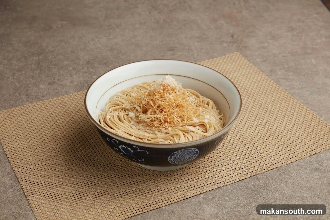 Bowl of noodles with toppings