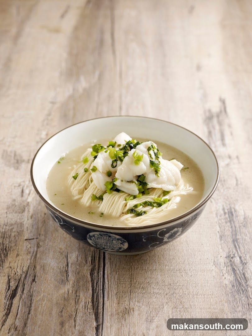 Bowl of Noodles with Fish and Scallions