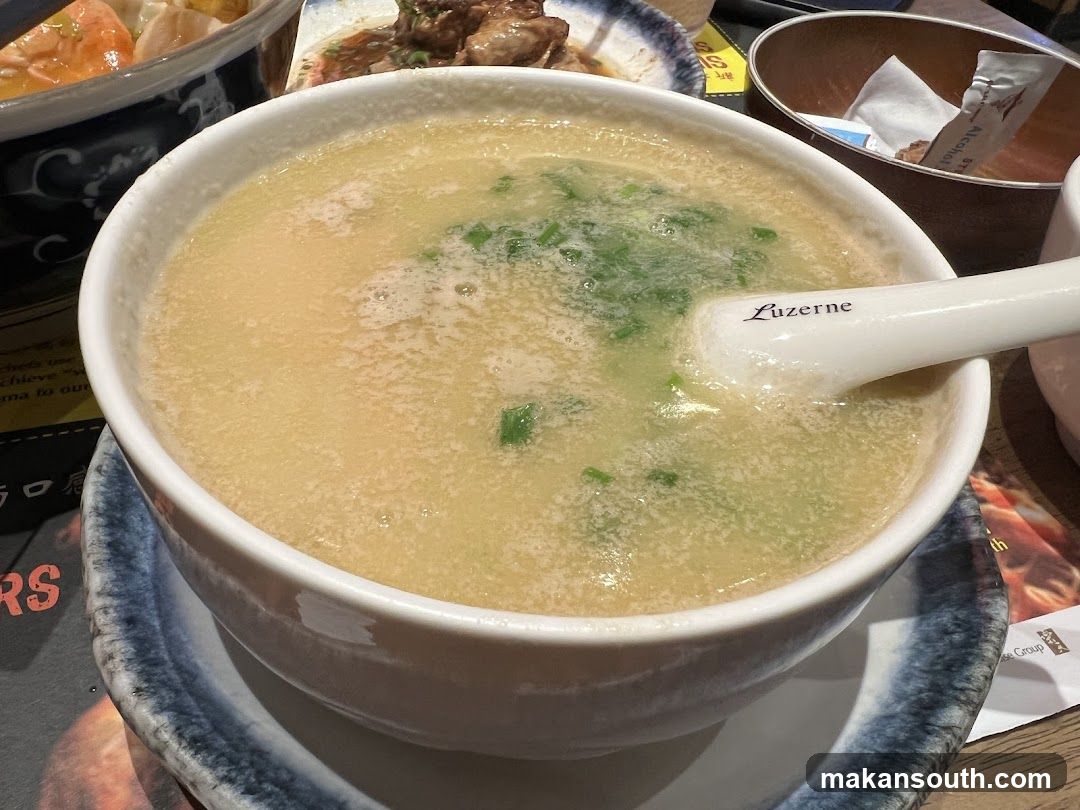 Bowl of Soup with Spoon