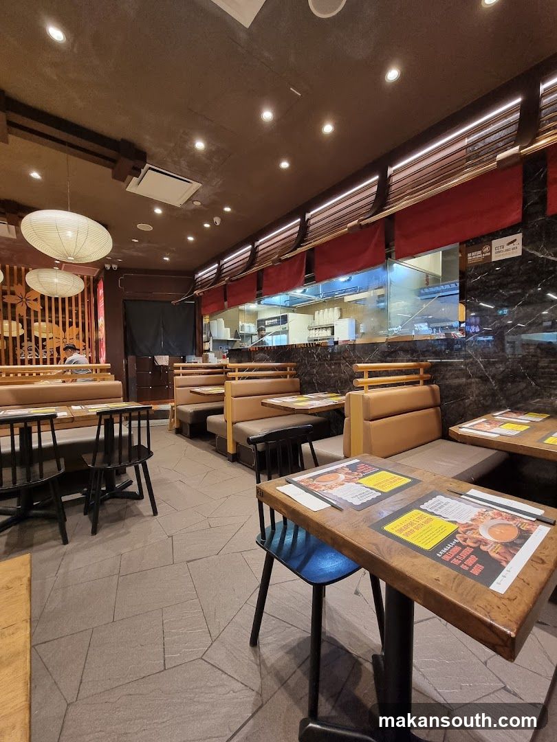Restaurant Interior with Booth Seating and Menu Flyers