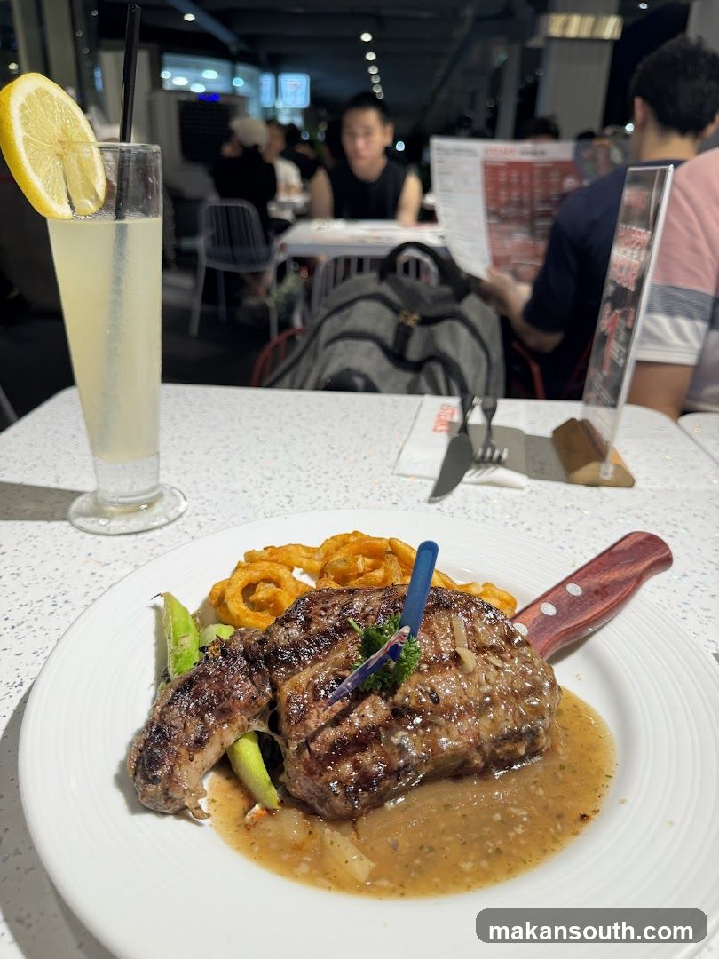 Steak and Onion Rings at Restaurant