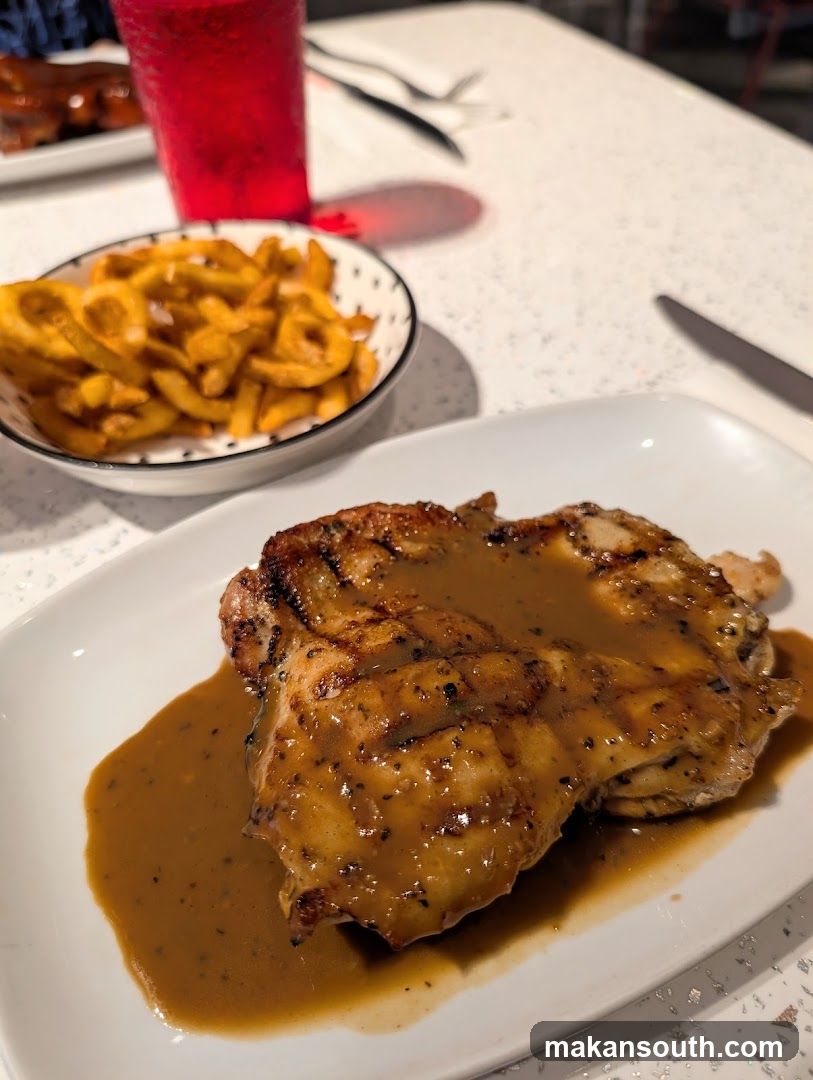 Grilled Chicken with Gravy and Onion Rings