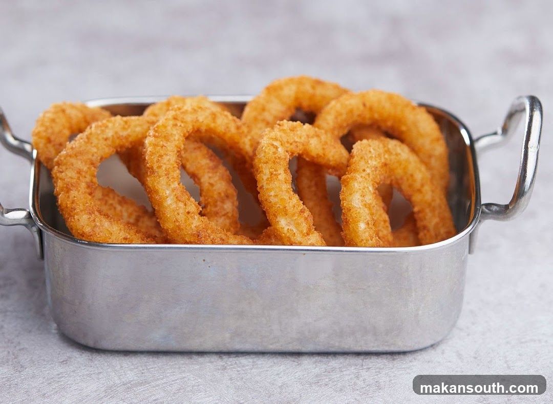 Fried Onion Rings in Metal Dish