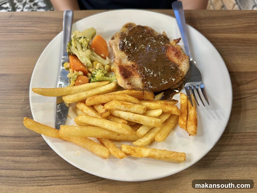 Plate of Steak with Fries and Vegetables