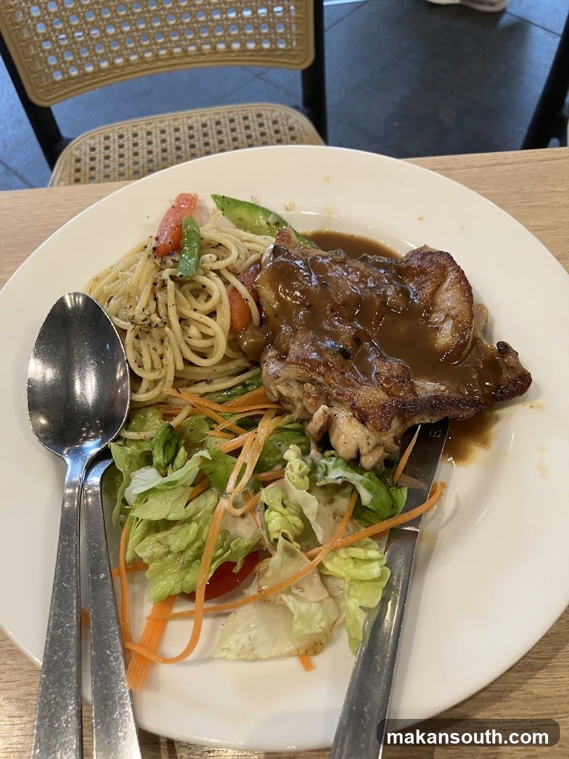 Plate of Chicken with Pasta and Salad