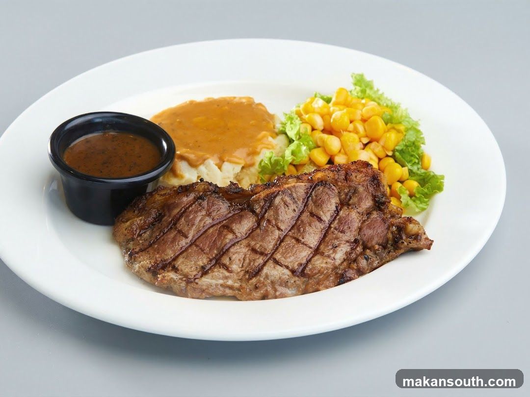 Grilled Steak with Mashed Potatoes and Corn Salad