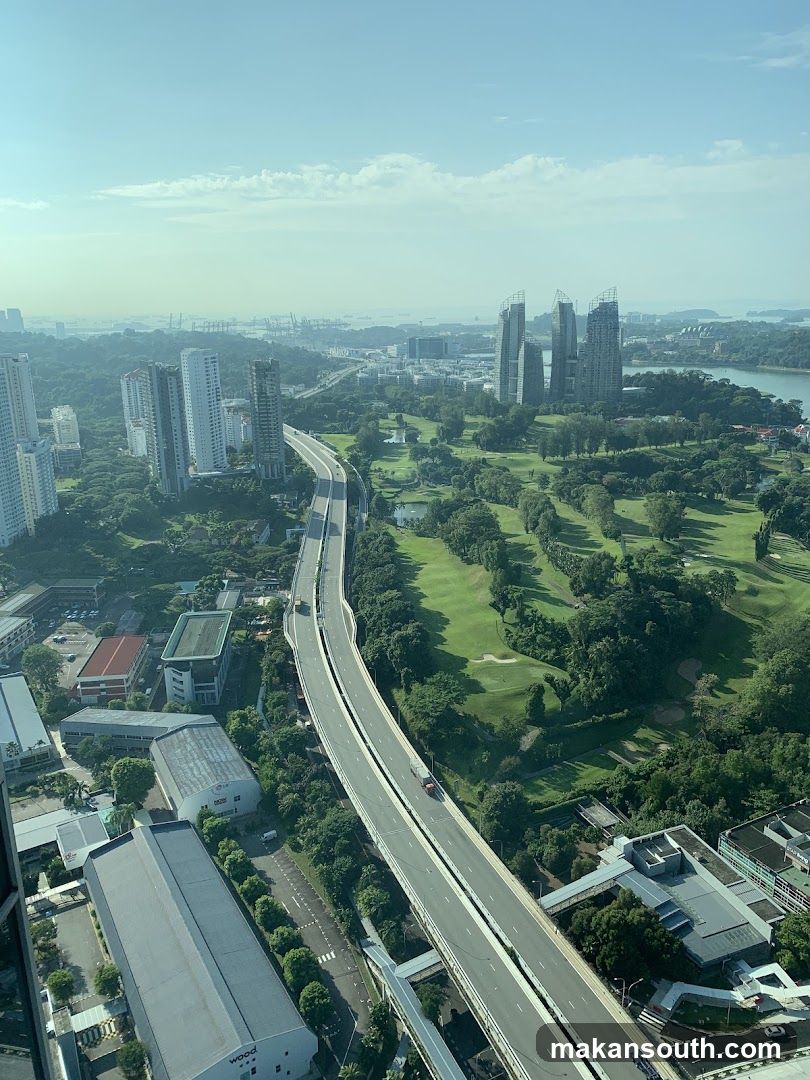 Cityscape with Golf Course and Highway