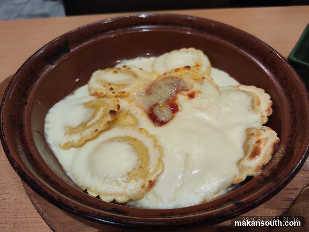 Baked Ravioli with Cheese Sauce