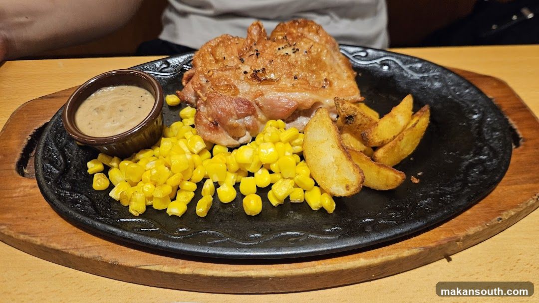 Sizzling Chicken Plate with Corn and Fries