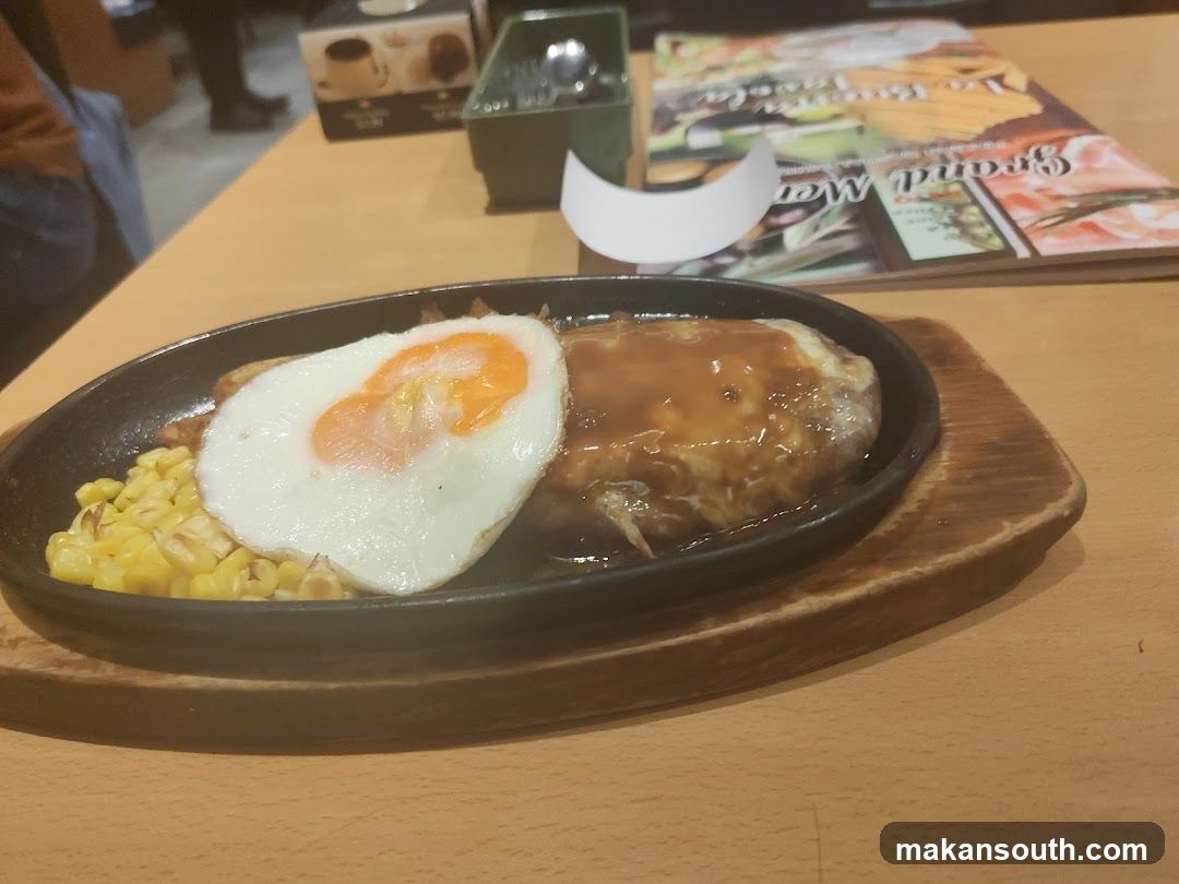 Sizzling Steak with Egg and Corn