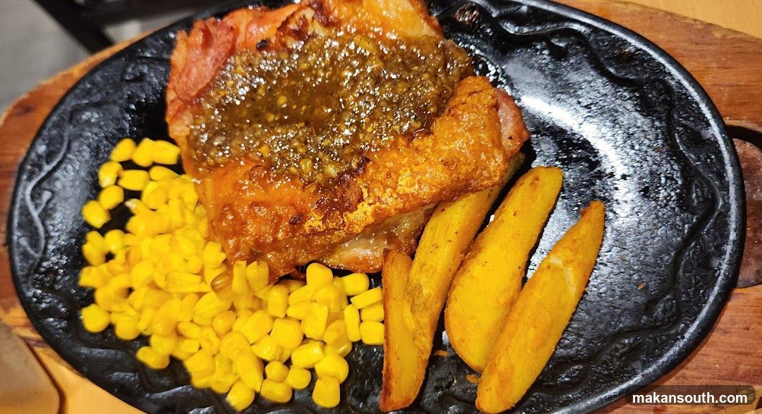 Sizzling Meat with Corn and Potatoes