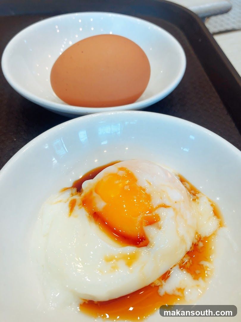 Egg Dish with Sauce and Whole Egg