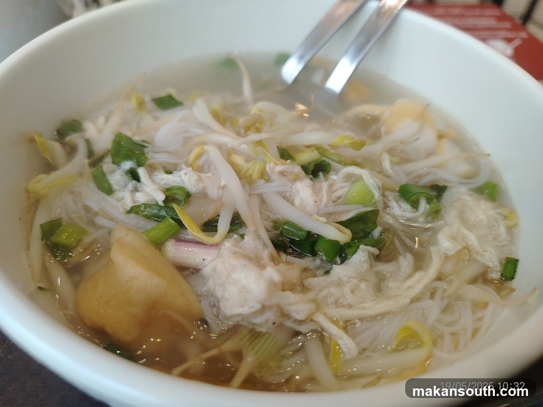 Bowl of Noodle Soup with Bean Sprouts and Scallions