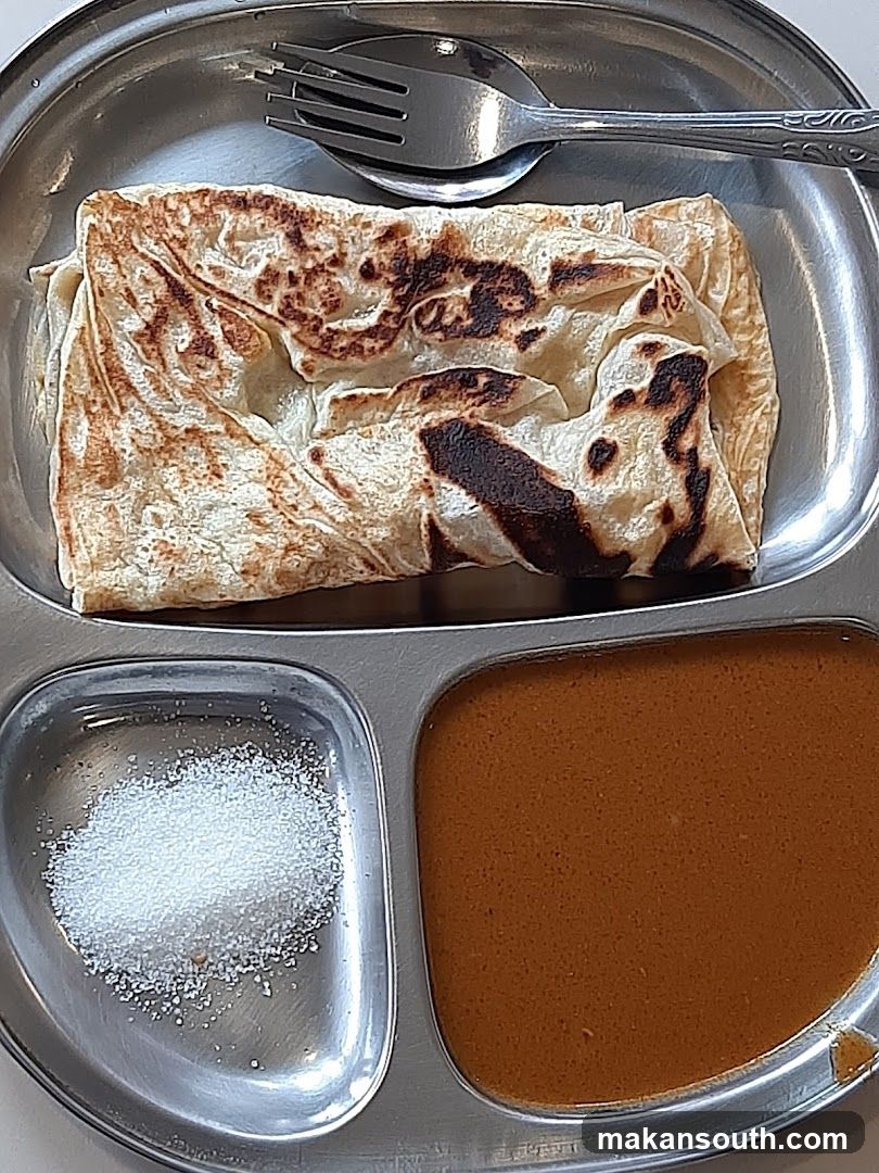 Roti Canai with Curry and Sugar